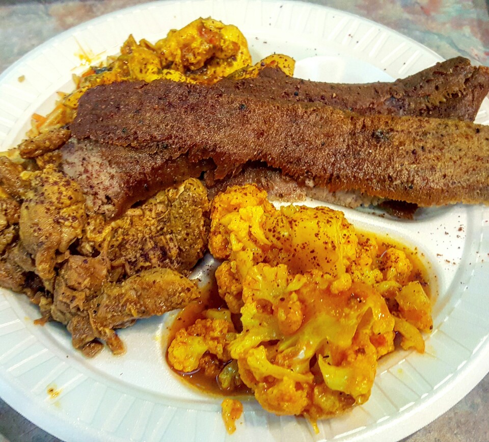 tender chunks of lamb curry, over a heaping pile of seasoned