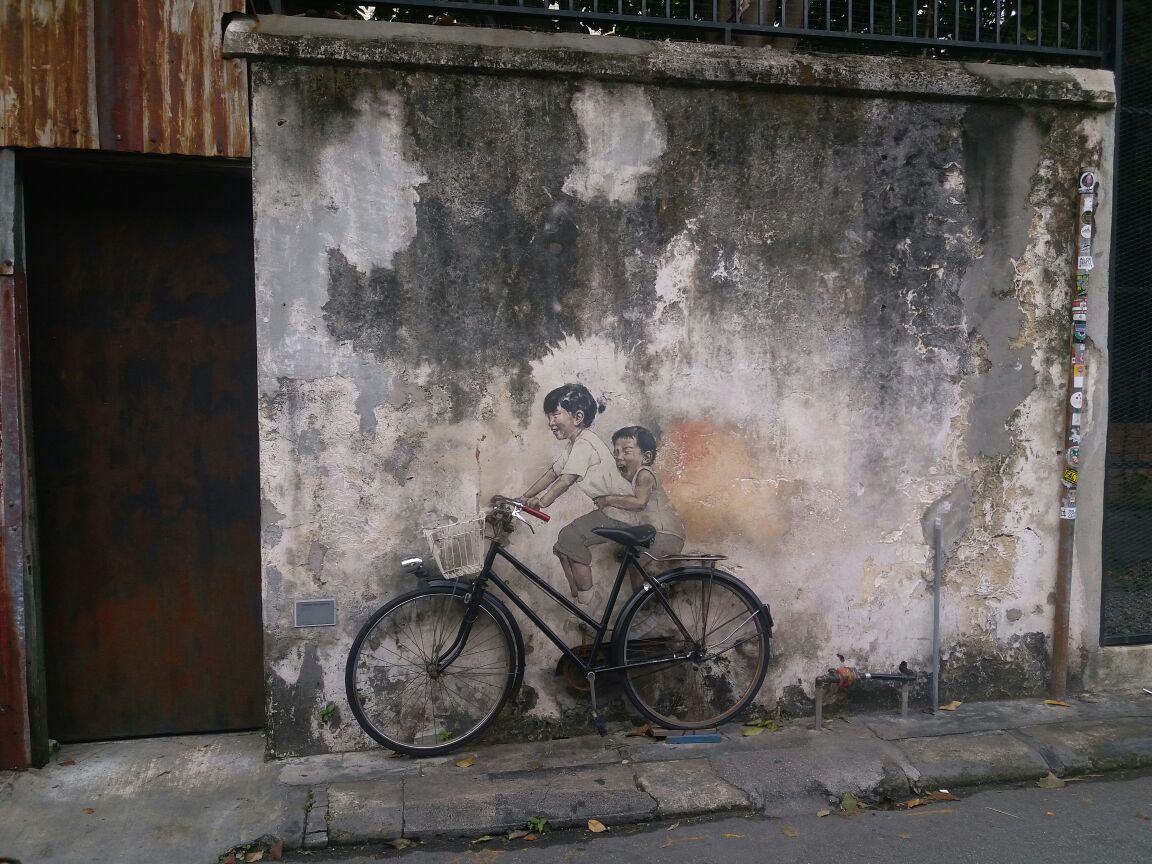 来到乔治城壁画街,租了一辆自行车,对着地图,开始壁画收集之旅.图片