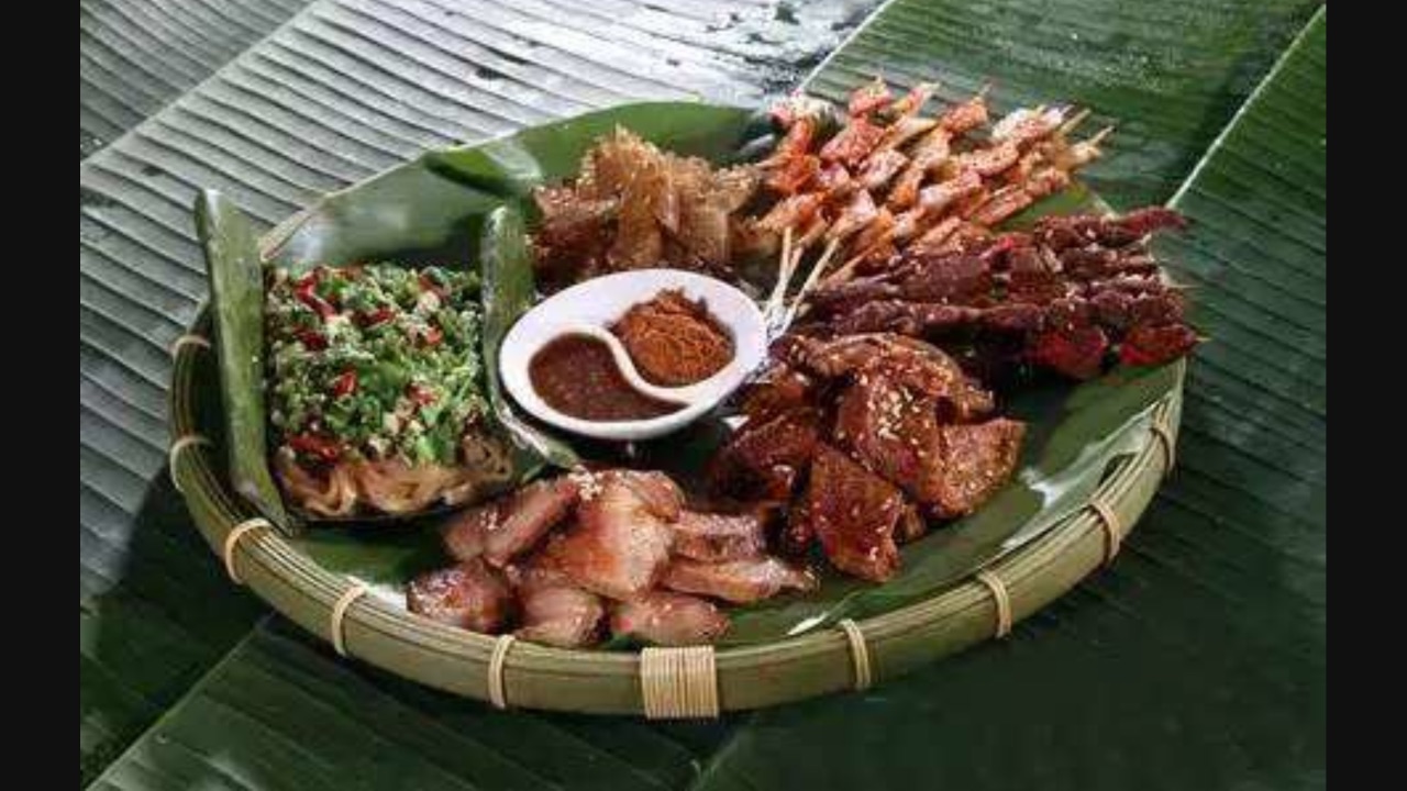 2022傣族人家(呈贡大学城店)美食餐厅,口味以酸辣为主,包烧的食物.