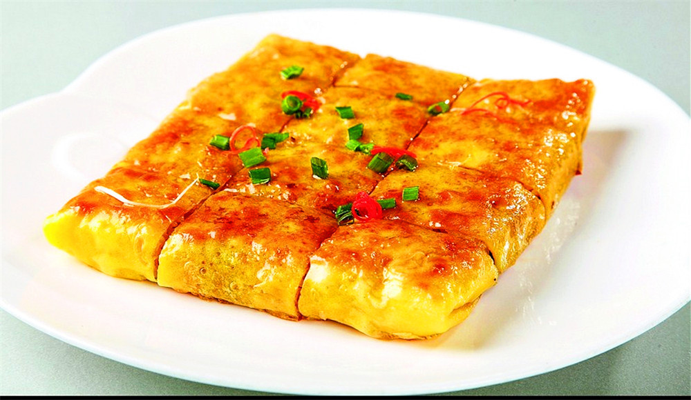 菜品丰富多样,又自成特色,是著名的"美食之都 武汉美食 三鲜豆皮