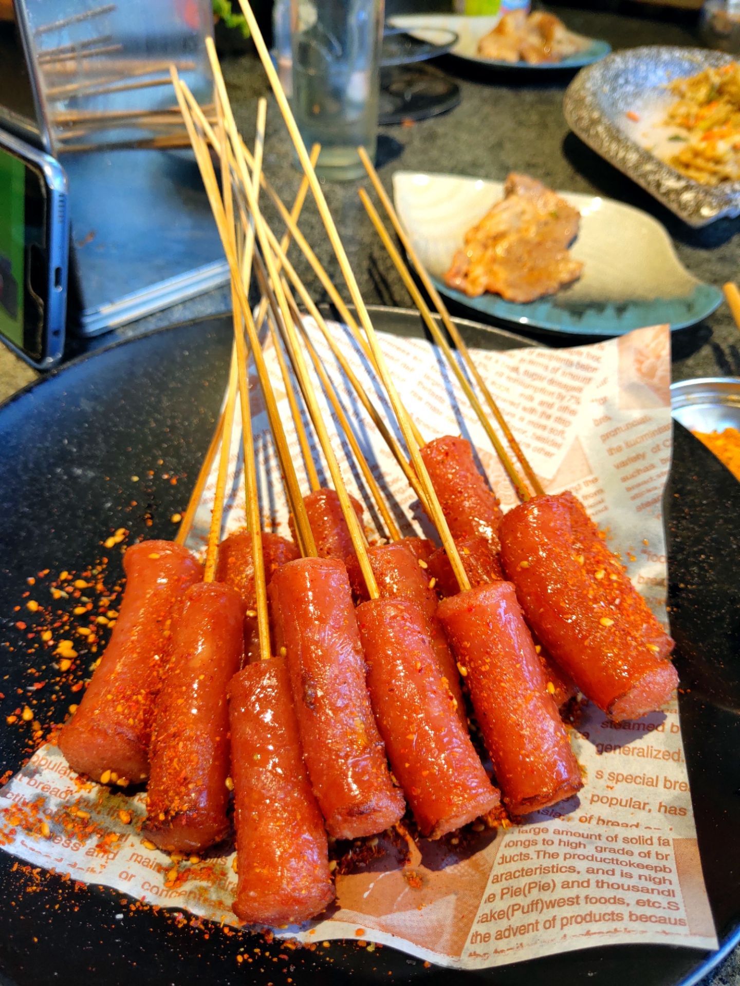 后来又加了一份干肠小串吐舌82还有大家一致推荐的烤酸菜真是好吃