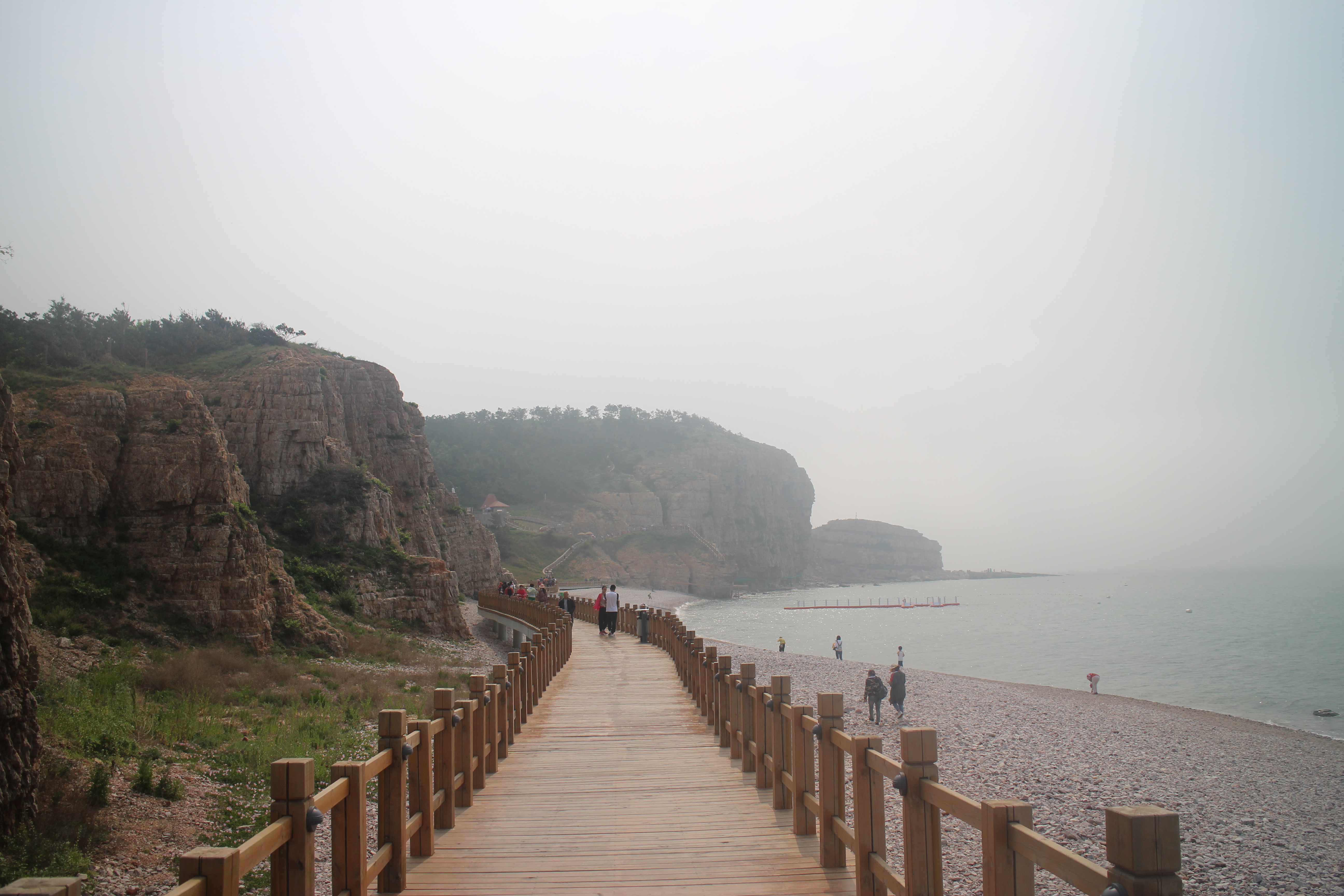 位于北长山岛的西北角,是岛上观看日落的最佳位置,实际高70多米,远不