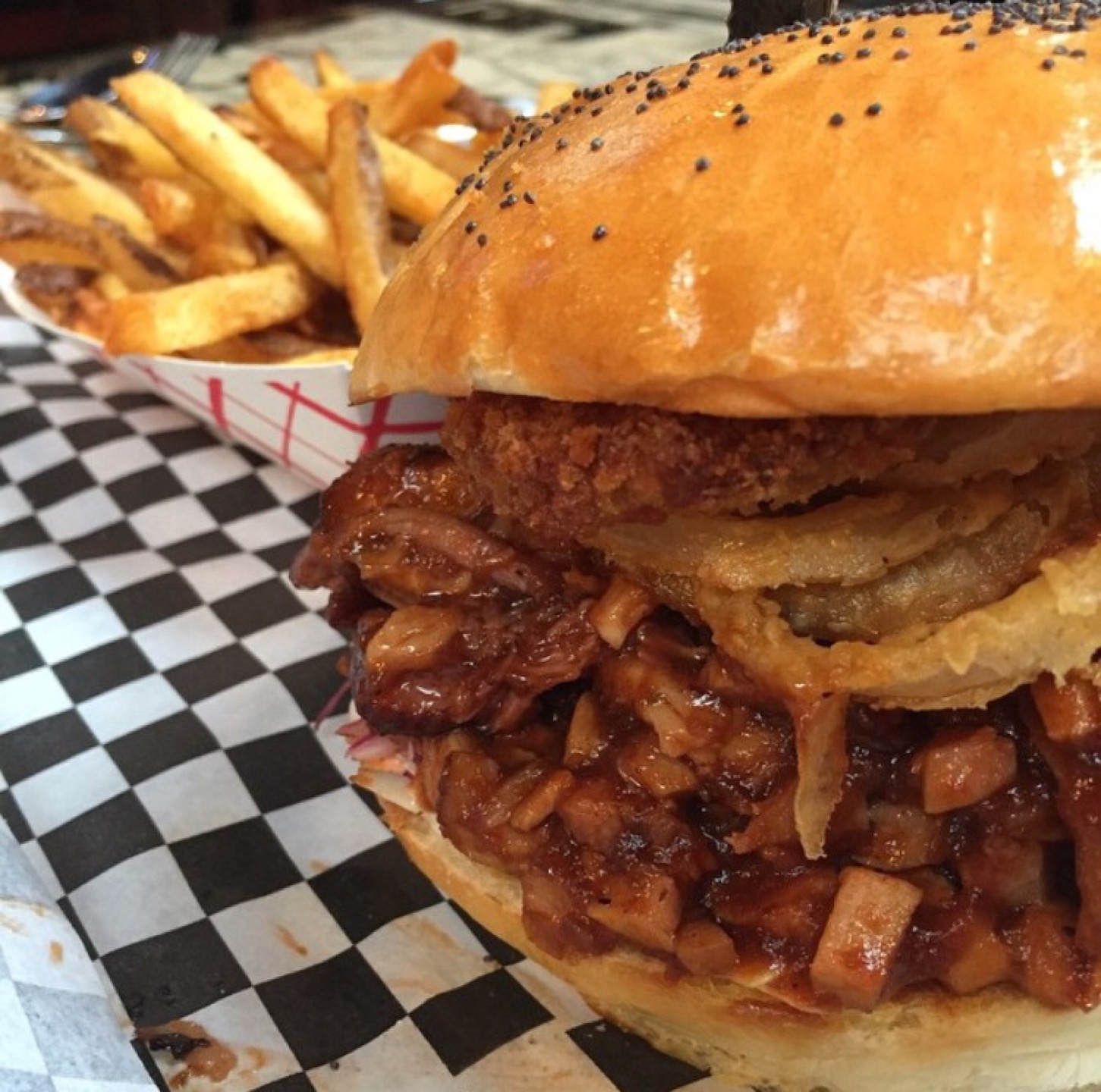 the burger build out begins with a blend of chuck, short rib