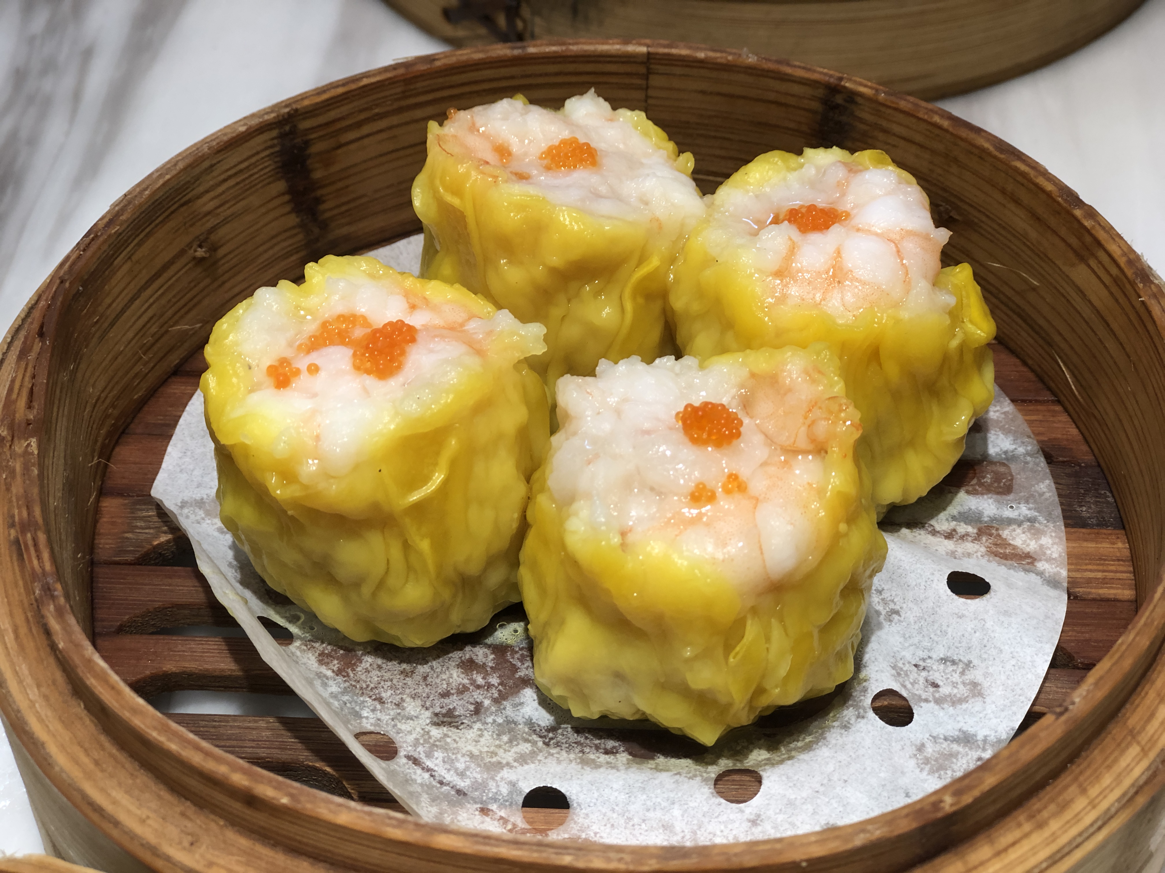 烧麦菠萝包肠粉之类的他们家的牛肉煎包味道也挺不错的带有一点甜味